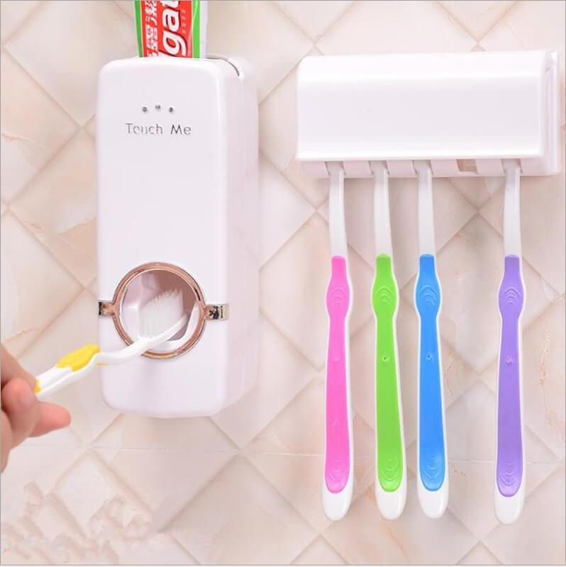 TOOTHPASTE DISPENSER WITH TOOTHBRUSH HOLDER